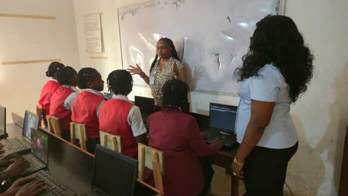 Chioma Okpara Teaching some Students